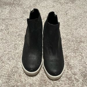 Black hidden wedge boots